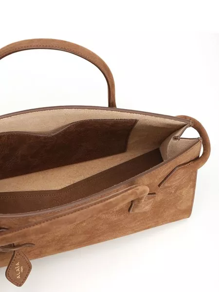 Alaïa East west tote bag in nubuck for Women - US | Al Duca