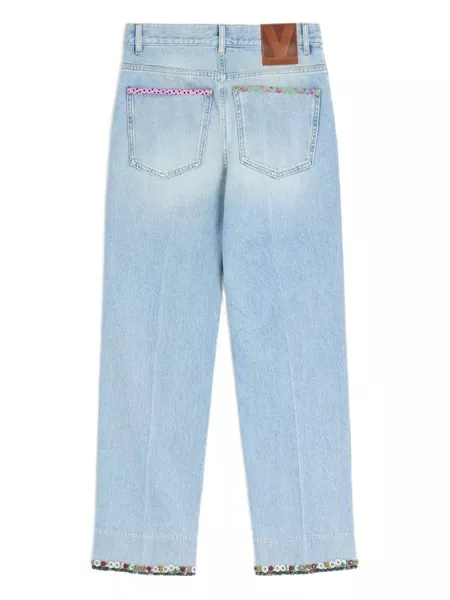 Valentino Garavani Denim trousers with embroidered flower trim for