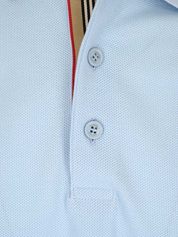 light blue burberry polo