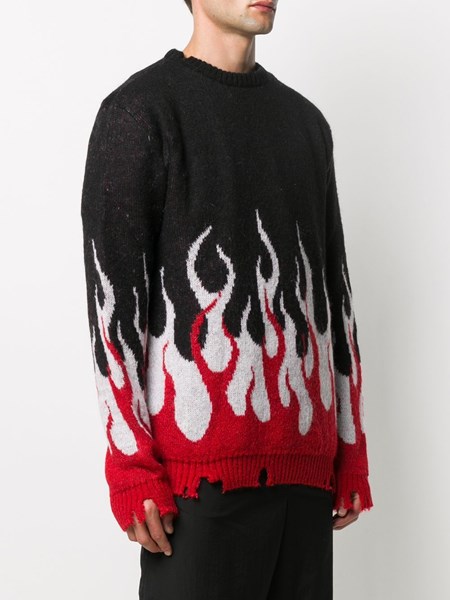 black sweater with red flames