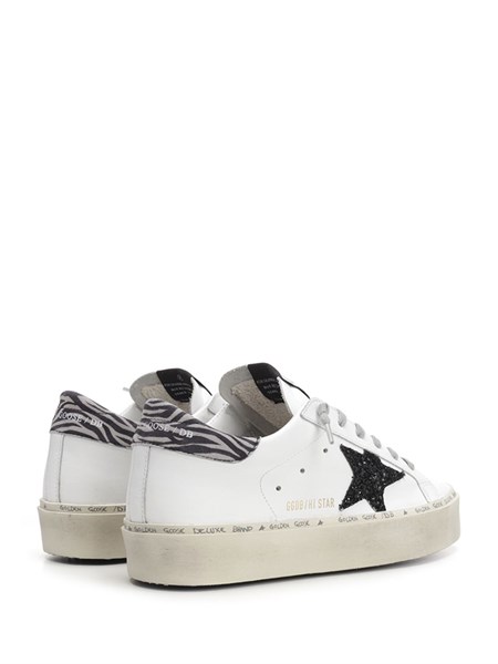 golden goose with black glitter star