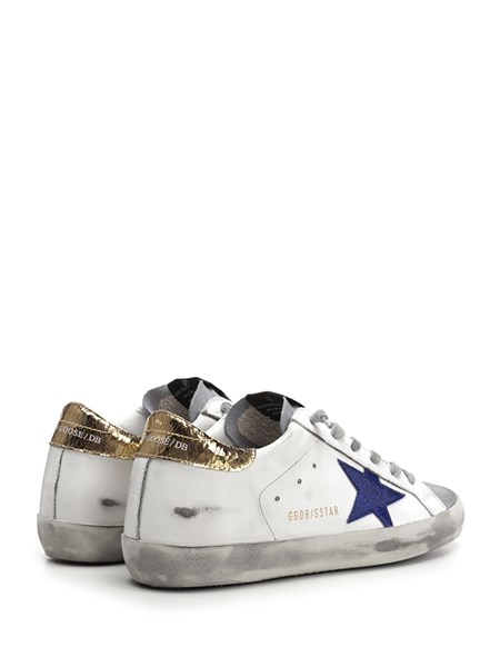 golden goose with blue star