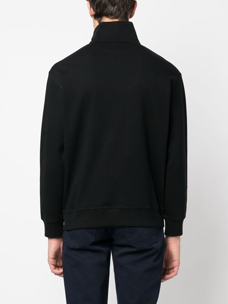 Black sweater in cotton fleece with turtleneck that can be opened with a zip