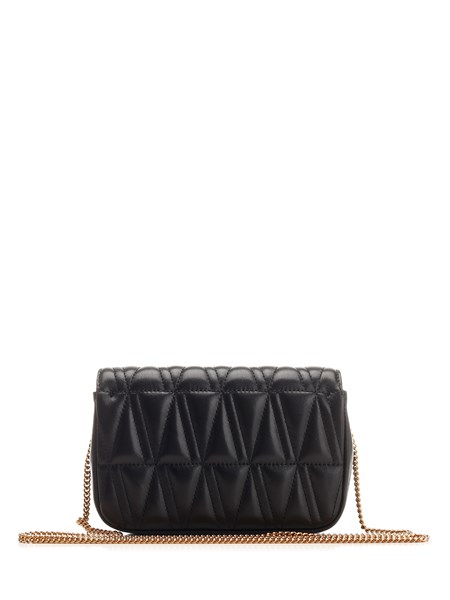 Shop Versace Mini Virtus Quilted Leather Crossbody Bag